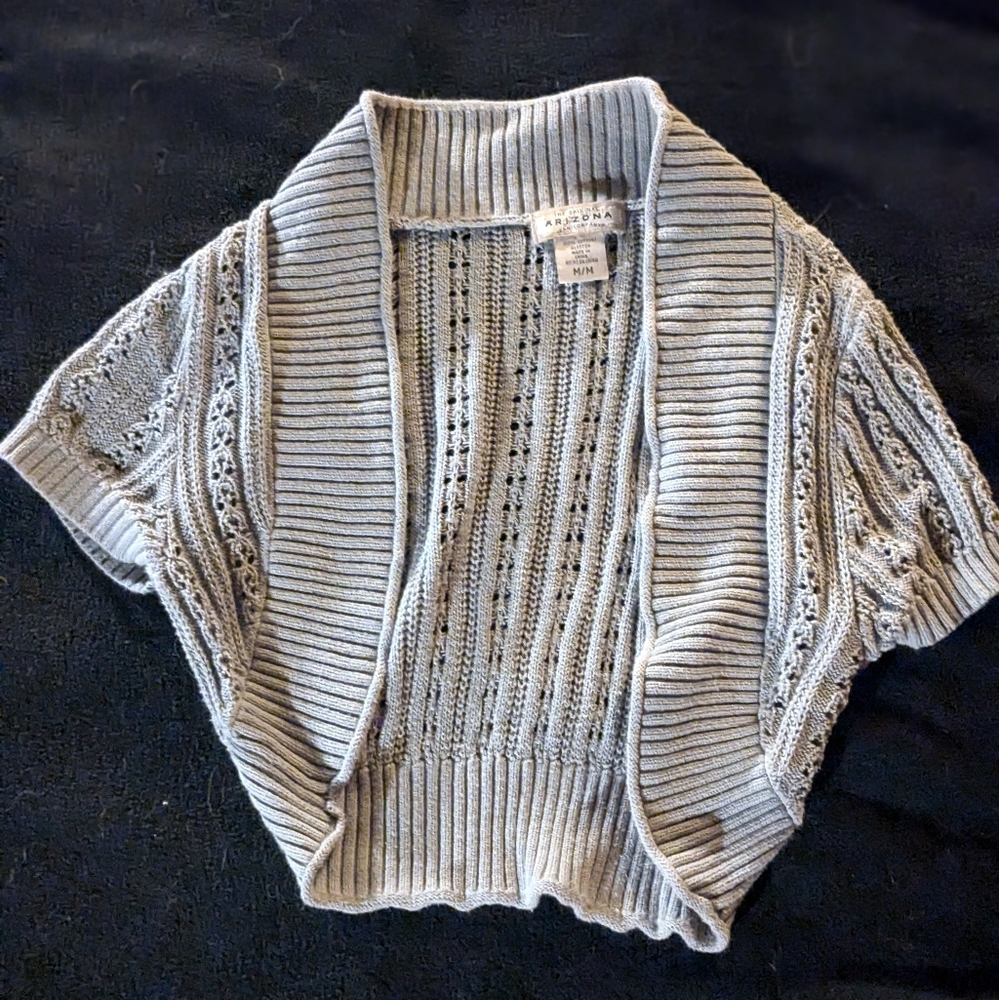 Grey shoulder cover